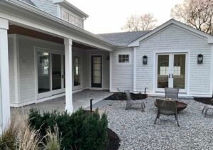 exterior-painted-home-with-outdoor-firepit-by-ulta-home